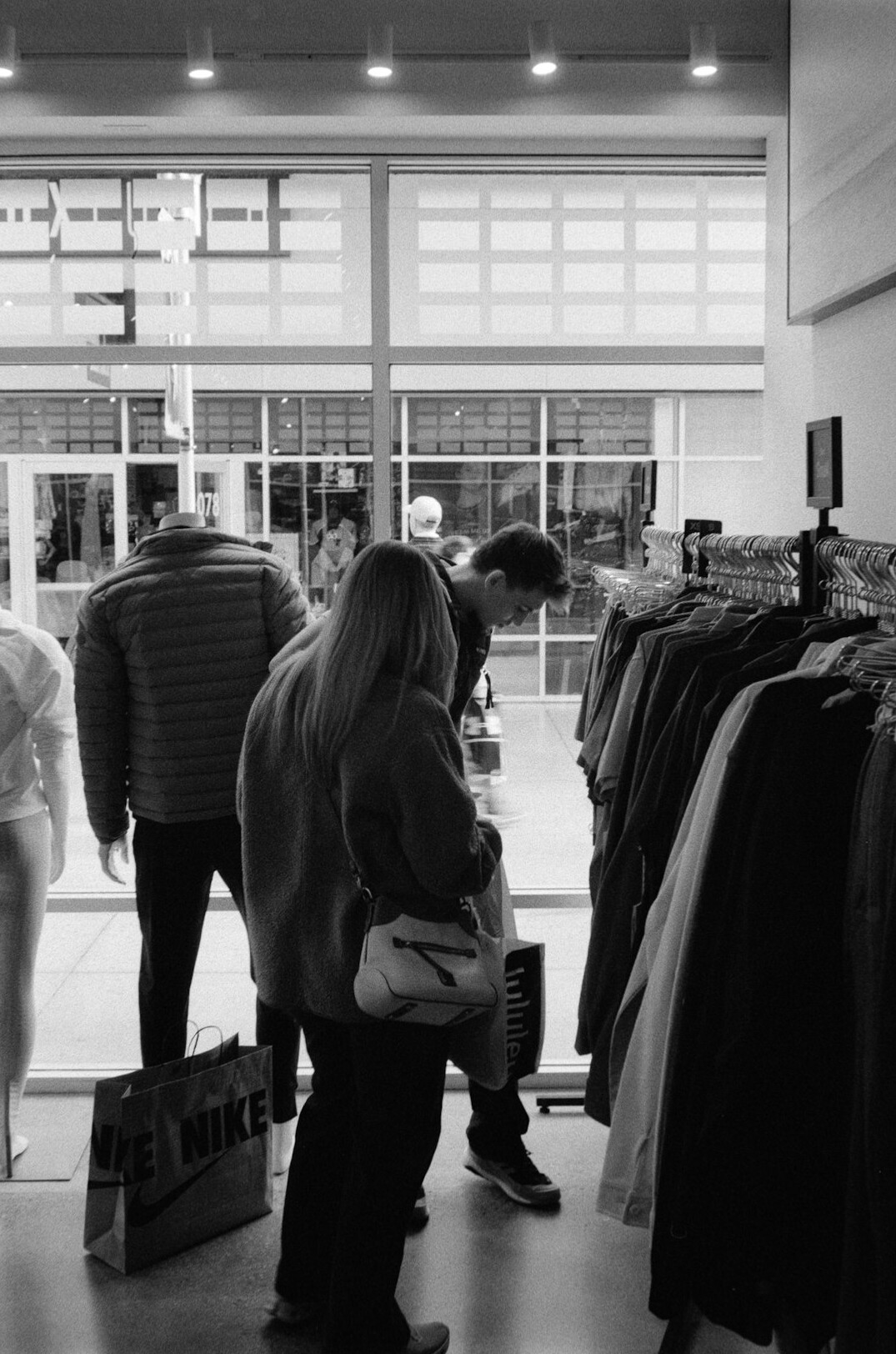 detective in clothing store
