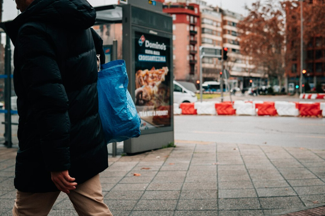 man with suspicious bag