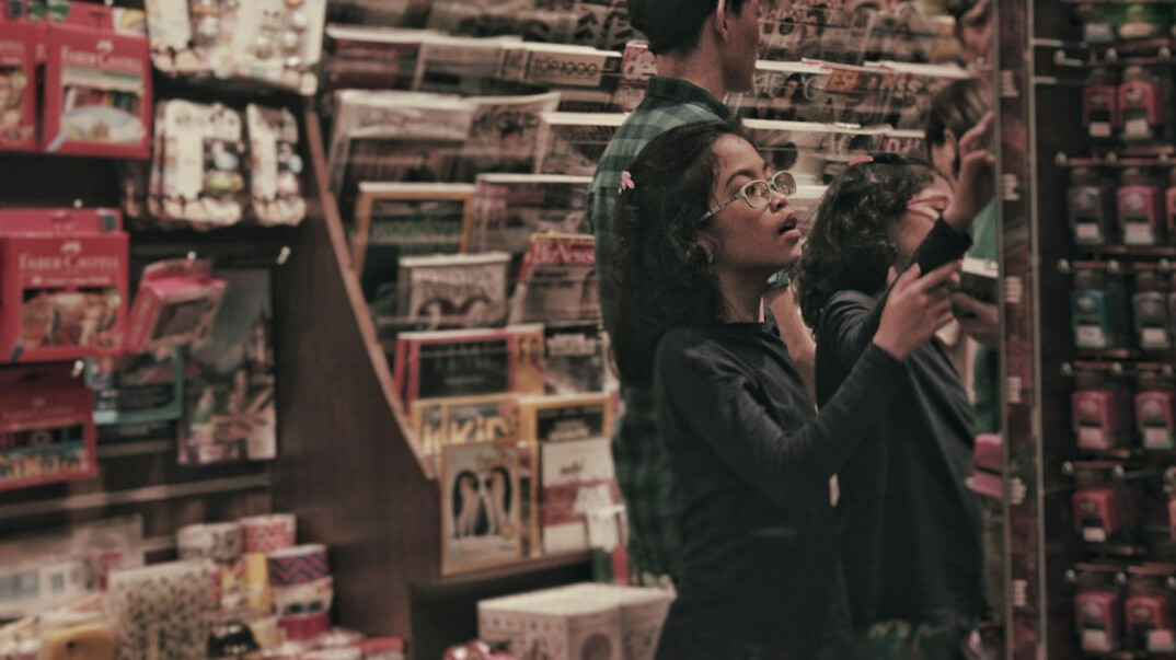 store detective observing shopper